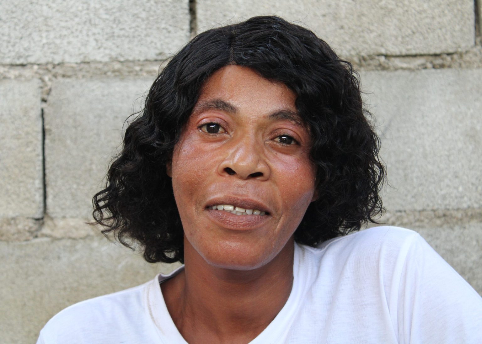Judaea, a woman involved in AVSI humanitarian emergency project in Haiti