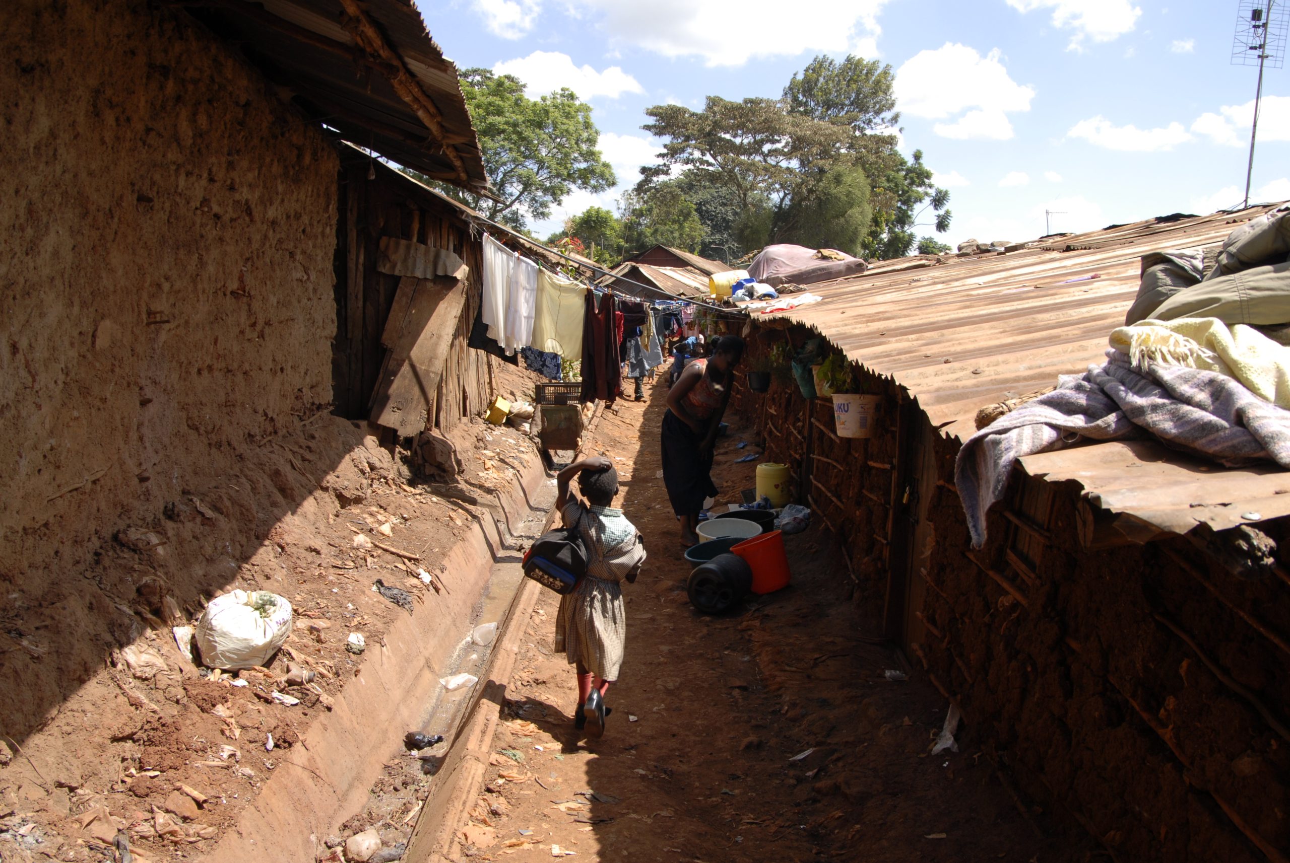 2006 - a child going from school in Kibera