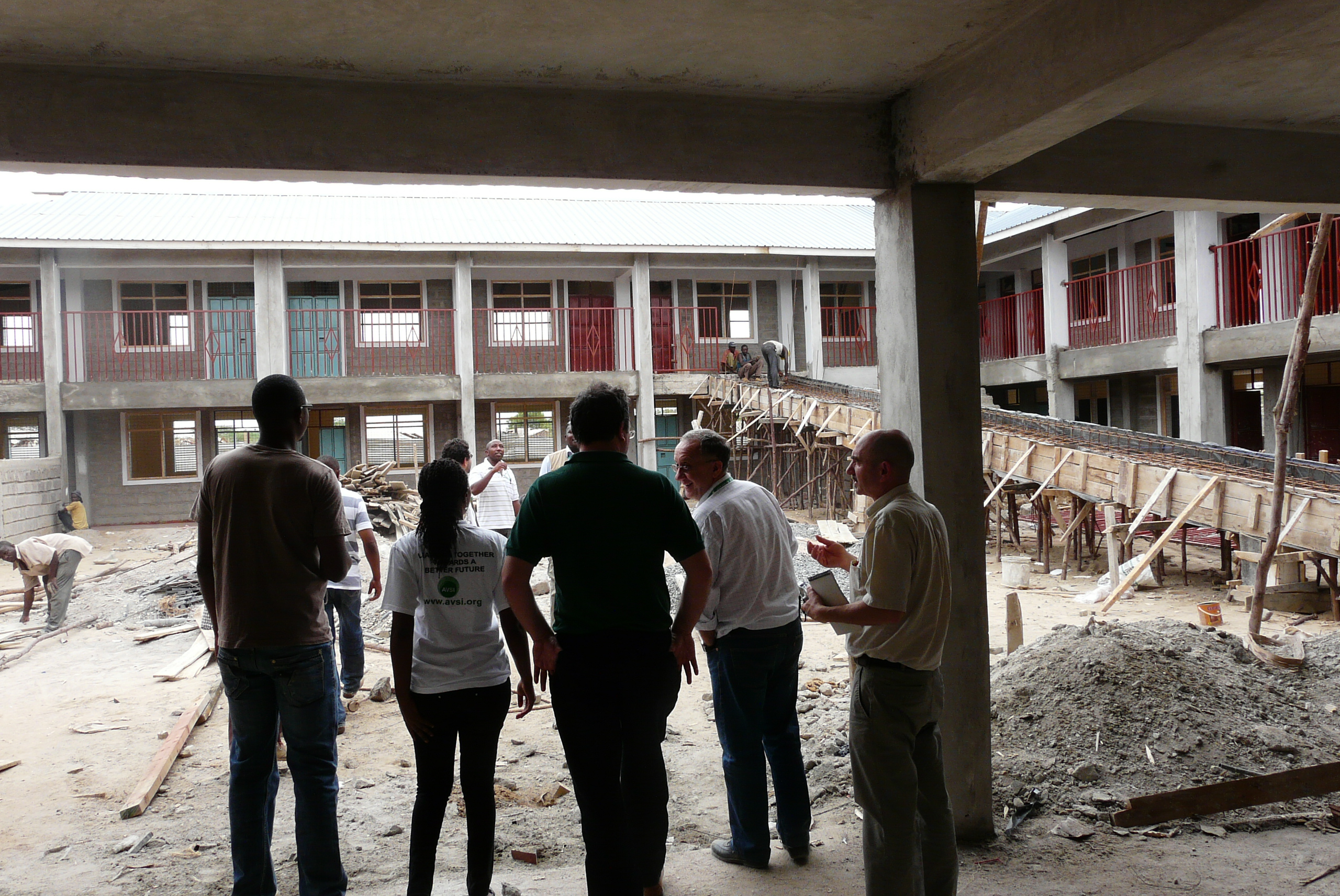 2012 - Giampalo Silvestri and Leo Capabianco supervise a construction by AVSI
