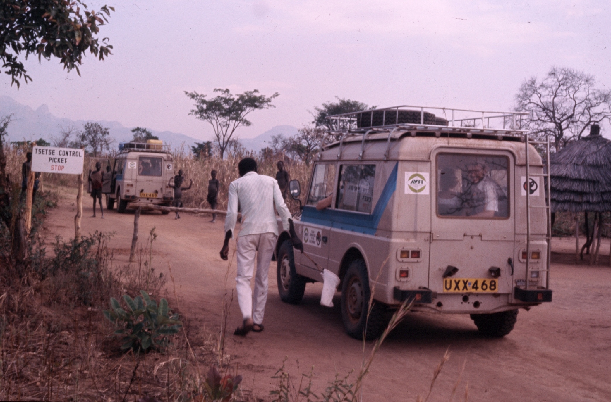 Filippo Ciantia - Two AVSI Campagnolas are stopped at a check-point for Tsetse control on the road towards Palabek Health Centre