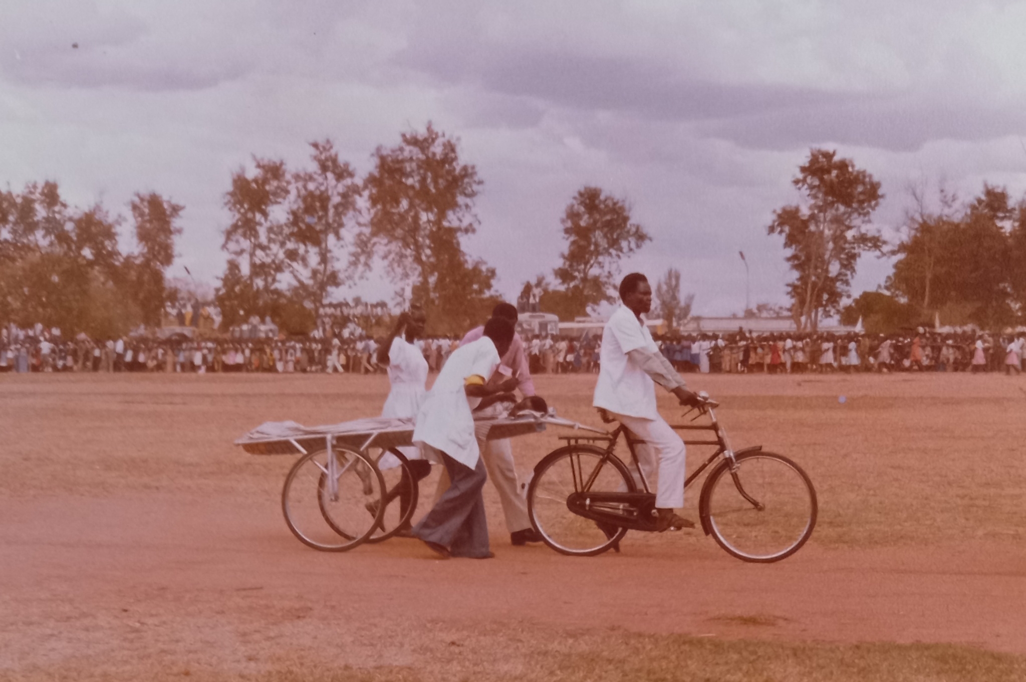 Filippo Ciantia - Kitgum-Hosp-1980 - A public demonstration of the district bike-ambulance